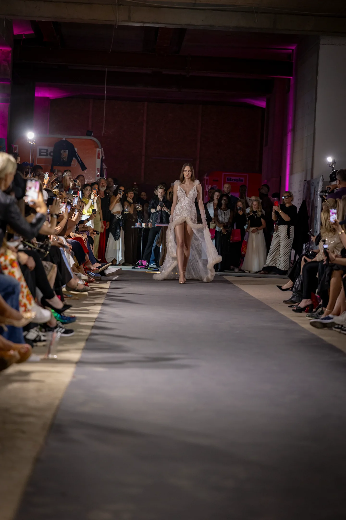 Full-length runway composition with structured black look.