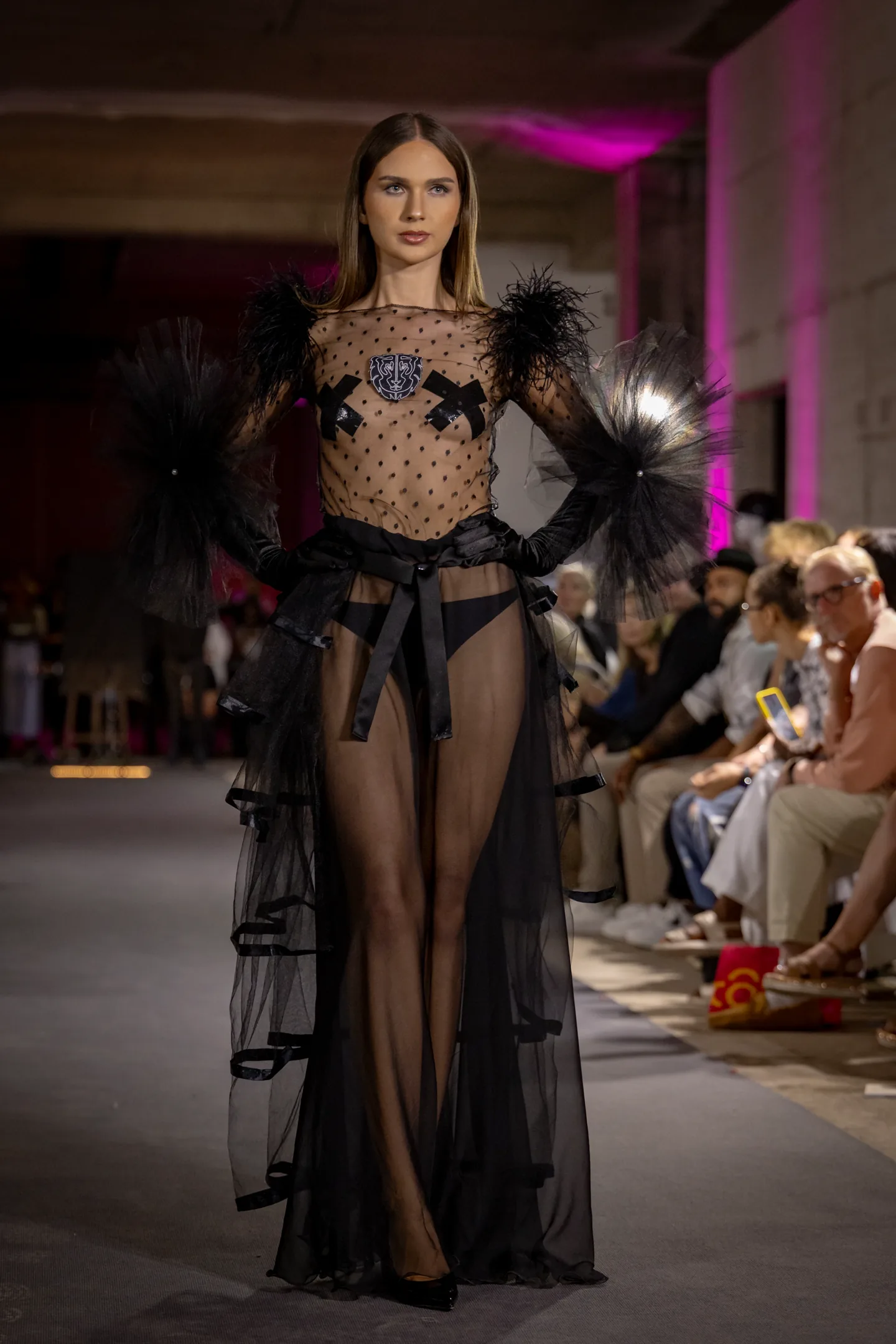 Eveningwear look with deep contrast and editorial framing.